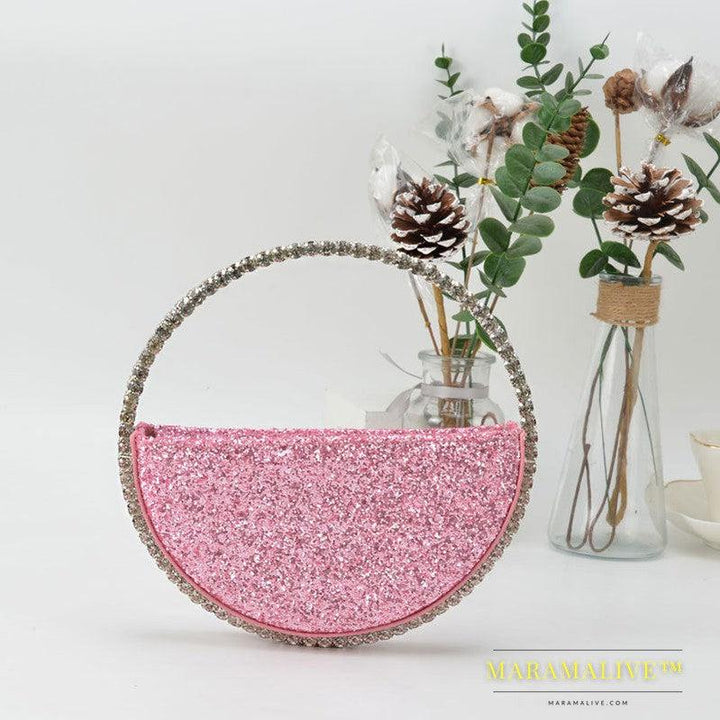 Diamond studded dinner bag with diamond heart-shaped clutch