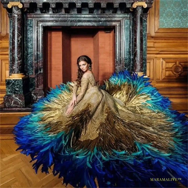 Haute Couture Golden Peacock Prom Dress with Vibrant Blue Hues and Off-the-Shoulder Long Sleeve - Opulent Evening Gown Party Dress with Custom Sizing and Feathers