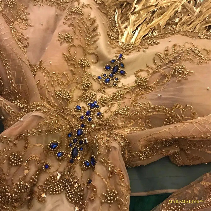 Haute Couture Golden Peacock Prom Dress with Vibrant Blue Hues and Off-the-Shoulder Long Sleeve - Opulent Evening Gown Party Dress with Custom Sizing and Feathers