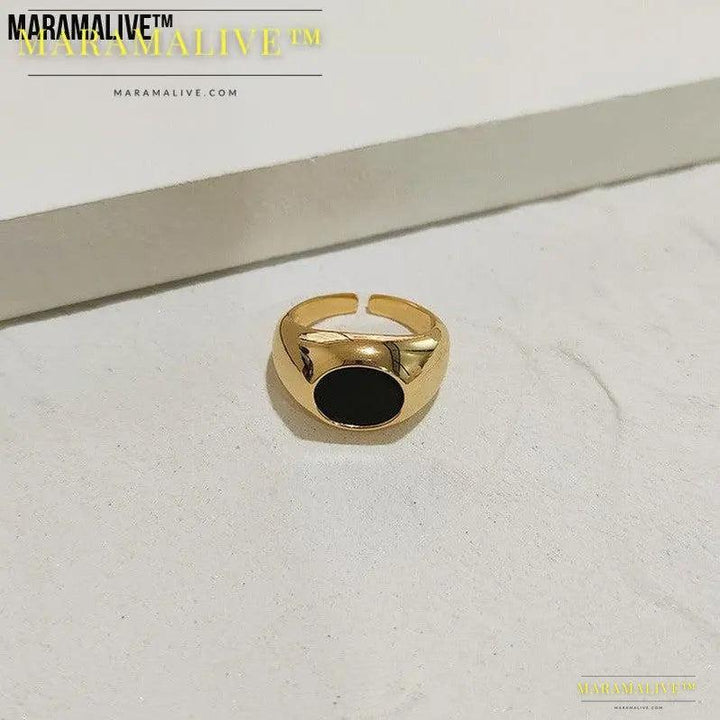 Introducing the Black Square Oval Ring - A Unique and Stylish Accessory for Any Occasion.